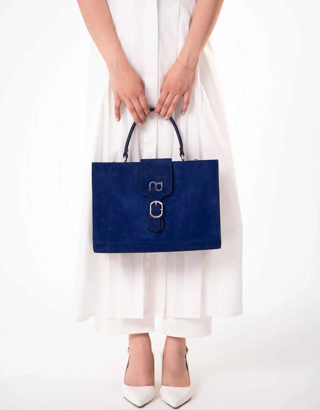 SUEDE STATEMENT HANDBAG