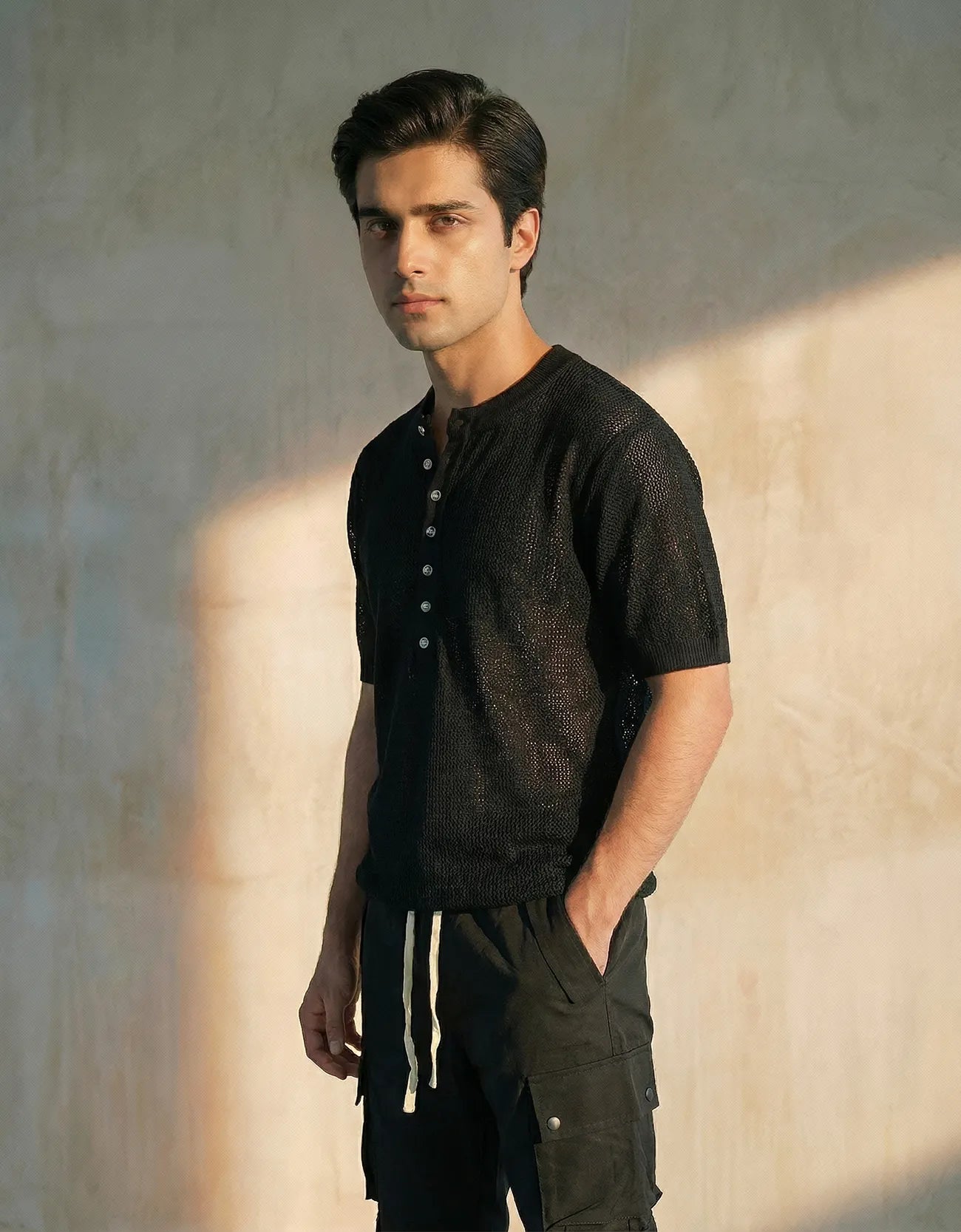 KNITTED QUARTER-BUTTON CREW NECK