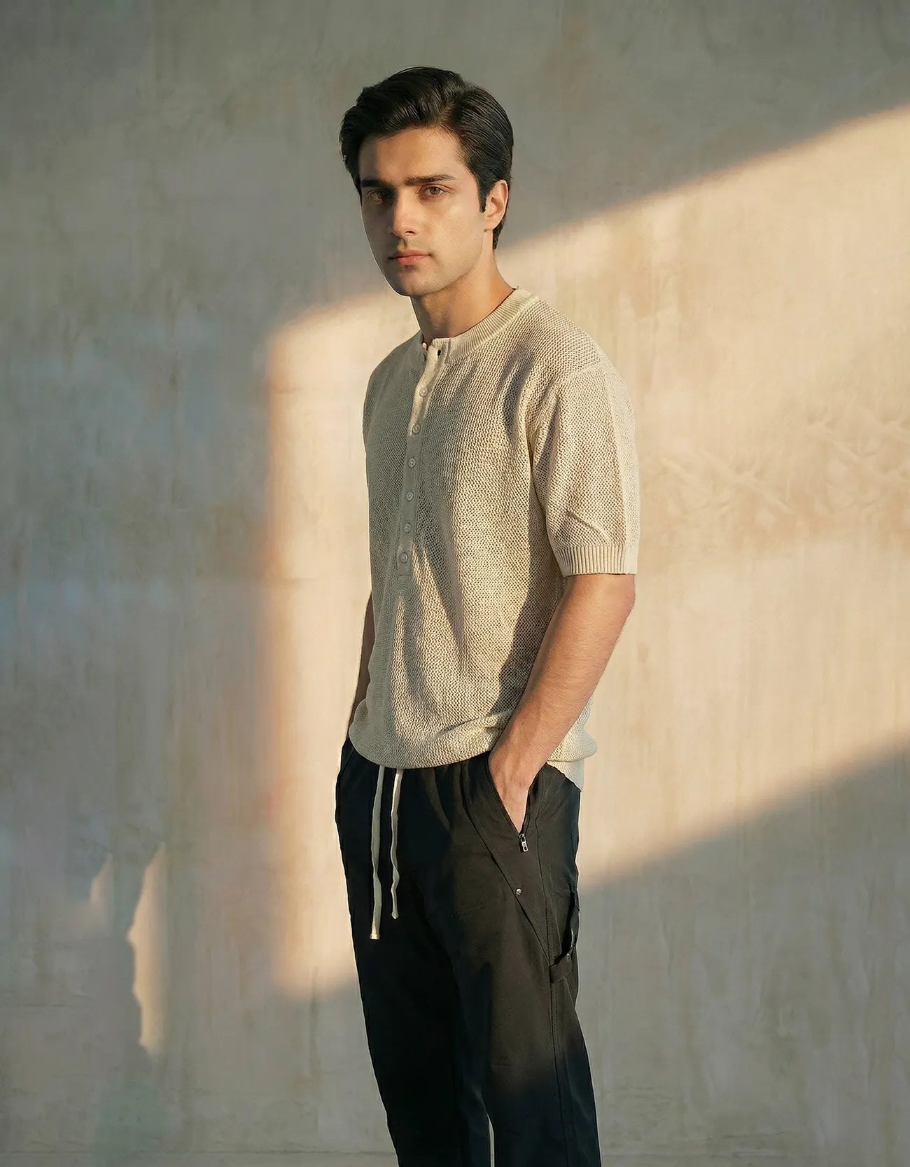 KNITTED QUARTER-BUTTON CREW NECK