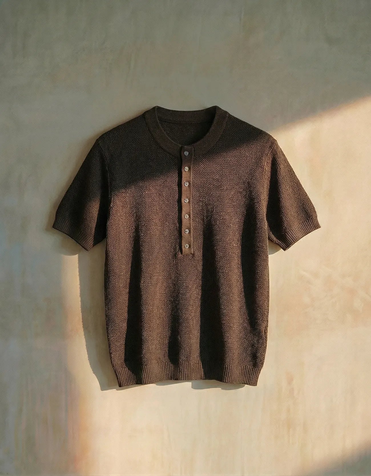 KNITTED QUARTER-BUTTON CREW NECK