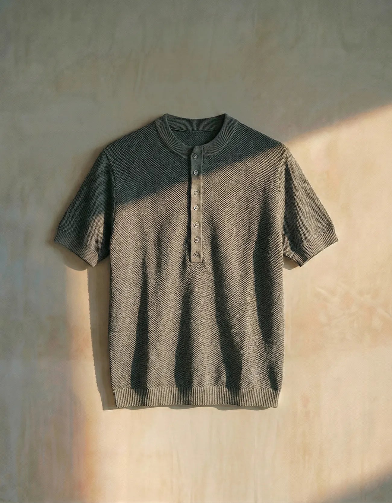 KNITTED QUARTER-BUTTON CREW NECK