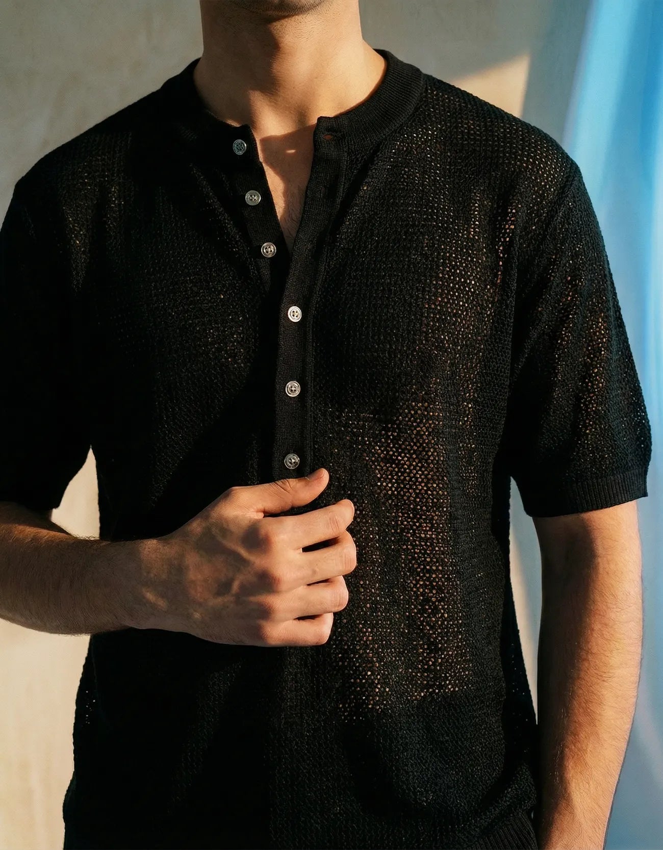 KNITTED QUARTER-BUTTON CREW NECK