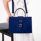 SUEDE STATEMENT HANDBAG