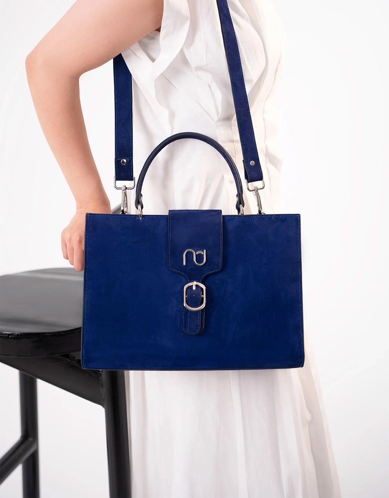 SUEDE STATEMENT HANDBAG