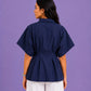 PLEATED PEPLUM SHIRT