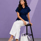 PLEATED PEPLUM SHIRT