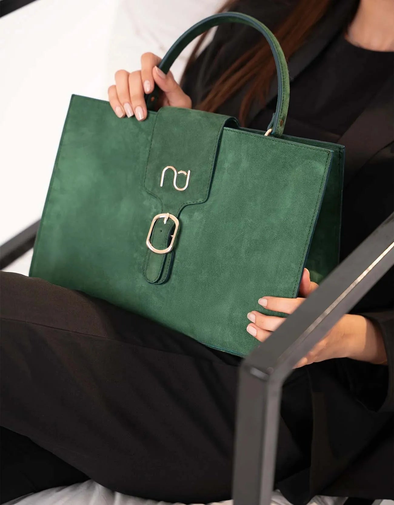 SUEDE STATEMENT HANDBAG