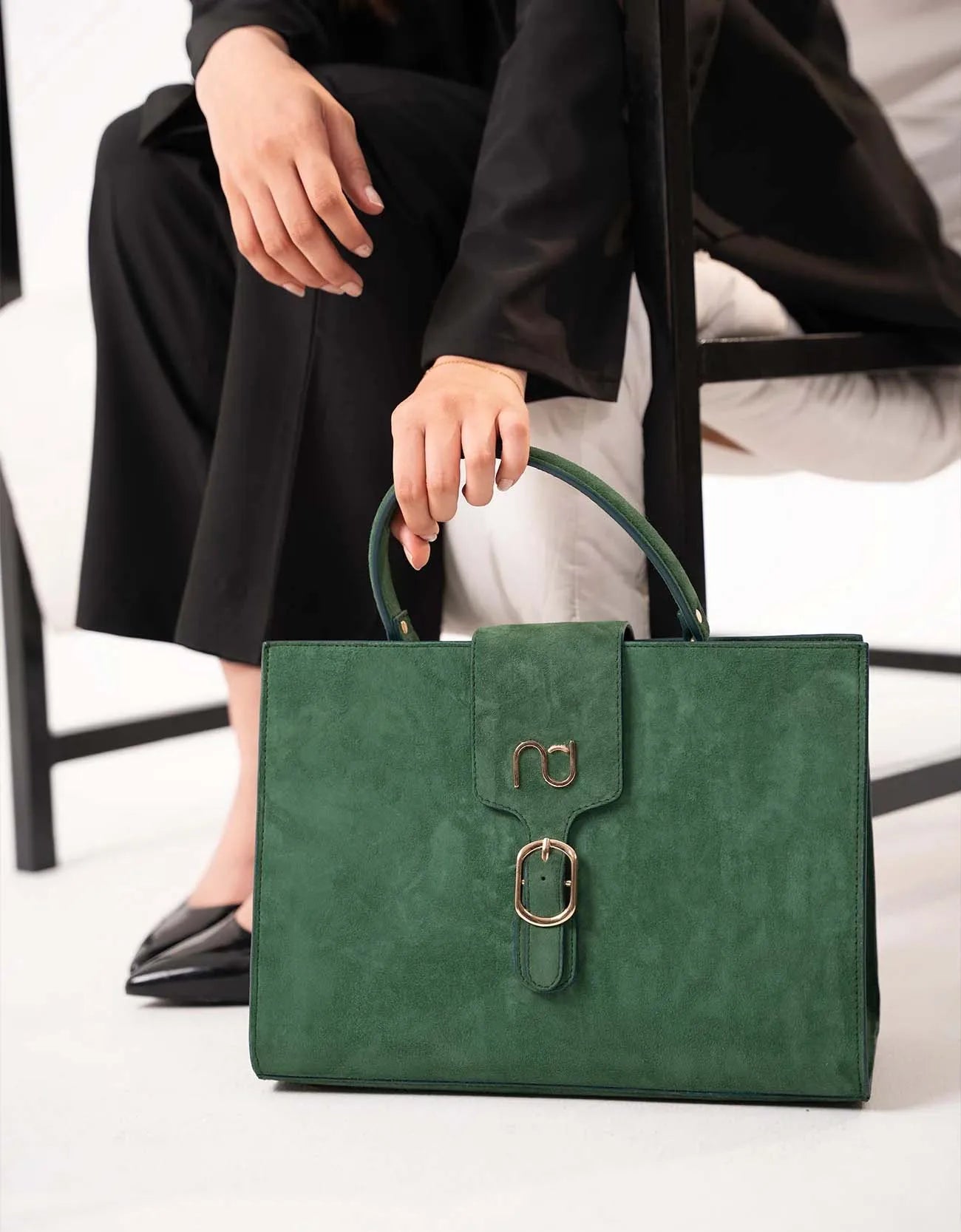 SUEDE STATEMENT HANDBAG